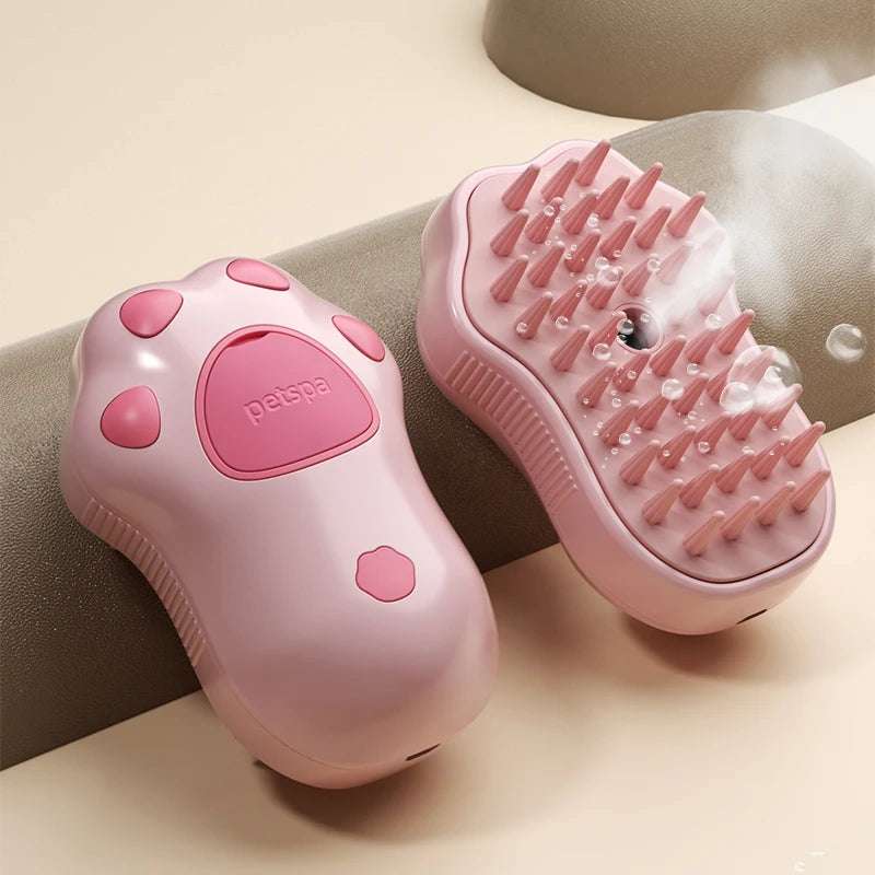 3-in-1 Pet Steam Brush grooming tool releasing steam with soft silicone bristles for dogs and cats