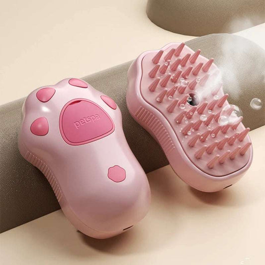 3-in-1 Pet Steam Brush grooming tool releasing steam with soft silicone bristles for dogs and cats